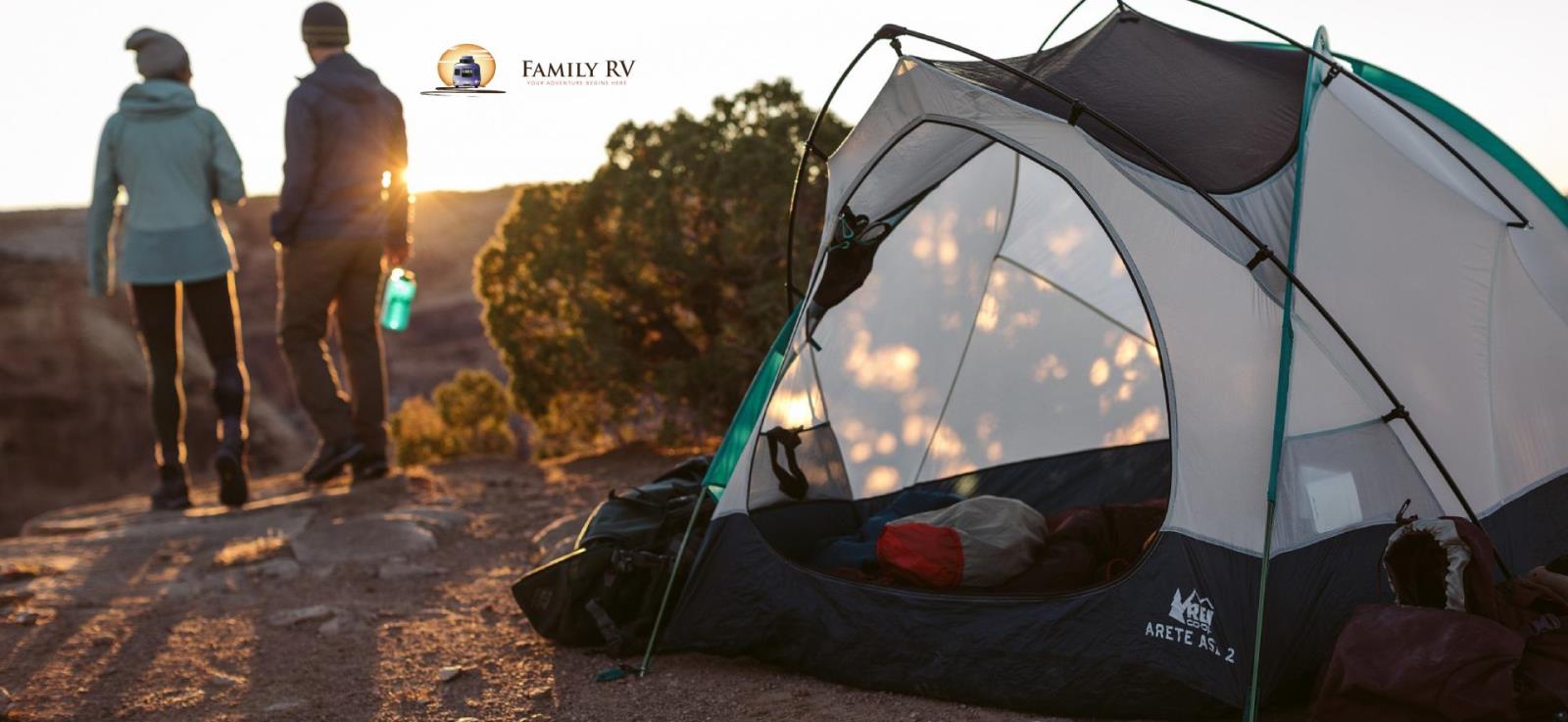 image of two people camping next to a tent