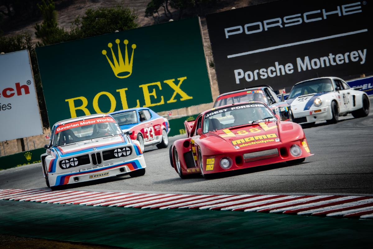 photo of cars racing on track