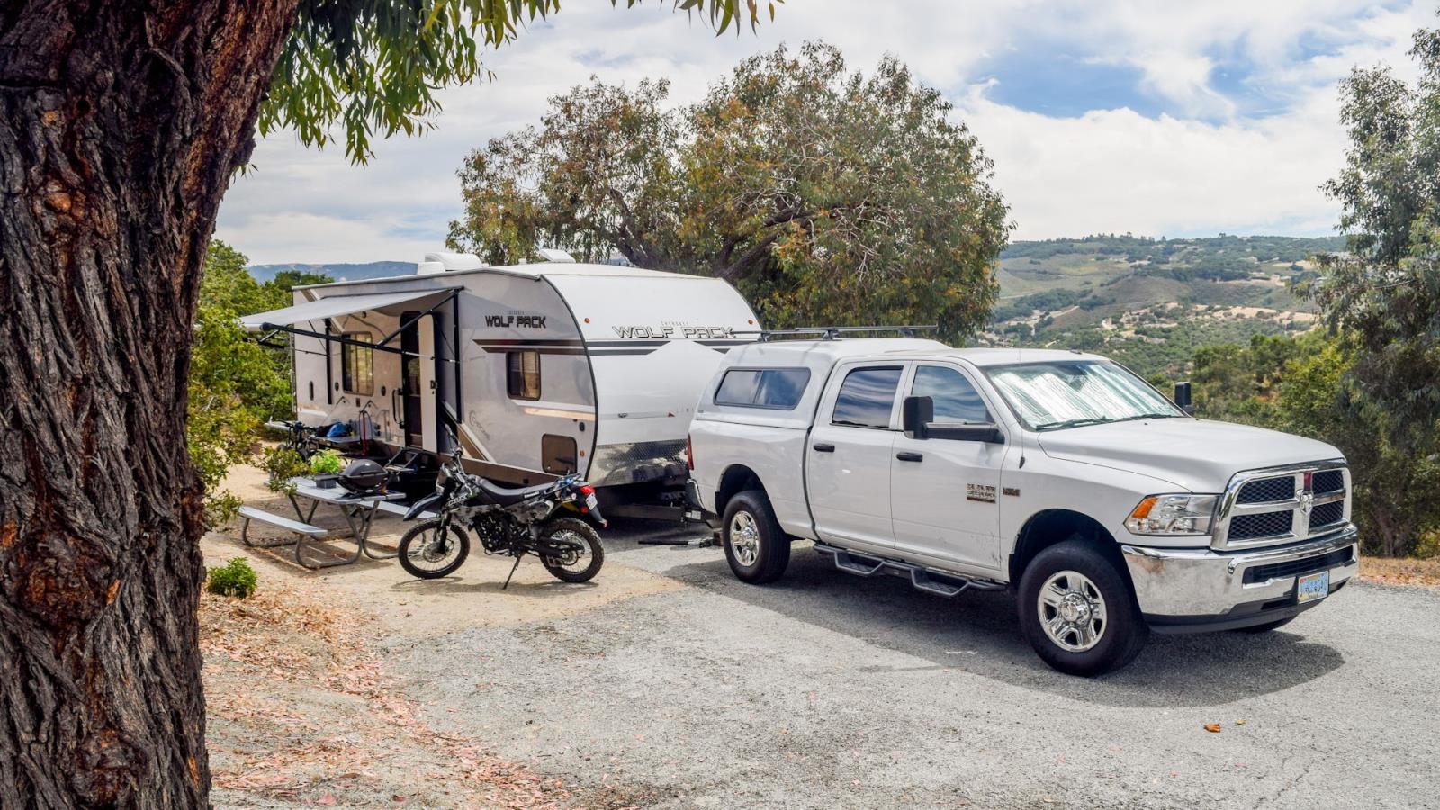 camper parked in hillside campsite