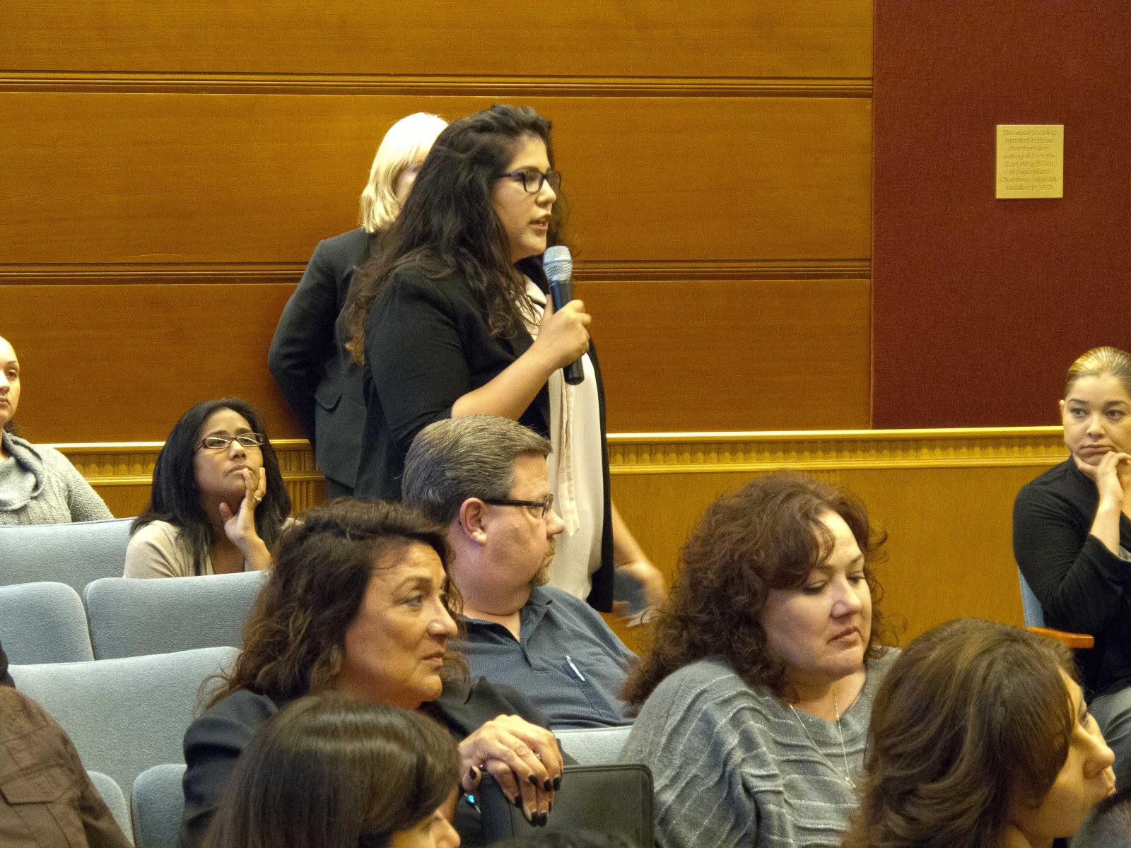 Female speaking on mic