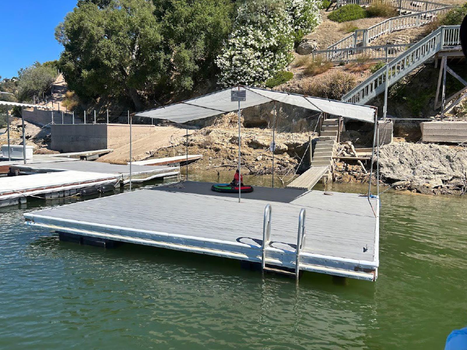 Unidentified number 5 boat dock in the water