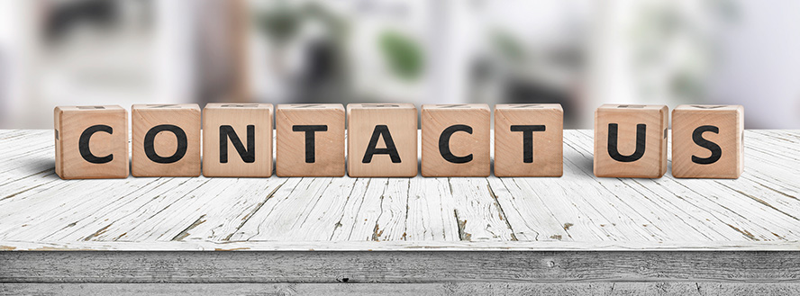 photo of wood blocks in a row spelling the words contact us_