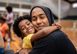 parent and child hugging each other